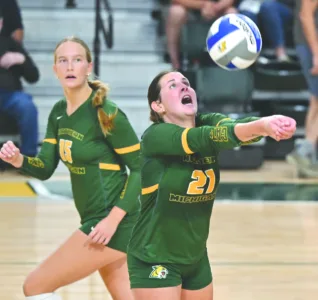 NMU volleyball splits on road after plenty of close sets